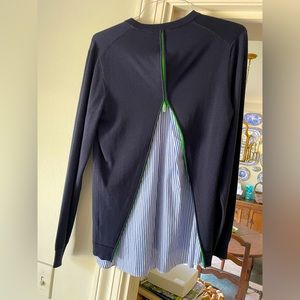 Tibi navy sweater with blue and white cotton stripe back panel and green zipper